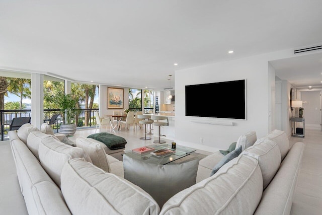 living room featuring expansive windows