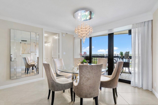 dining room featuring crown molding, light tile patterned floors, and a chandelier