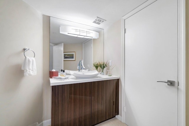 4545 N Ocean Blvd Unit 11C, Boca Raton, FL 33431 - bathroom with vanity, tile patterned floors, and visible vents
