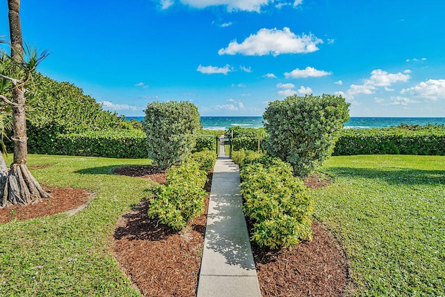 4545 N Ocean Blvd Unit 11C, Boca Raton, FL 33431 - view of home's community featuring a lawn and a water view