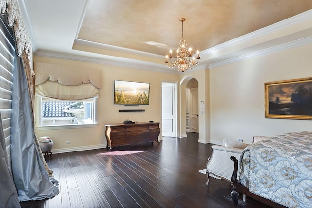 bedroom with a notable chandelier, dark hardwood / wood-style flooring, and ornamental molding