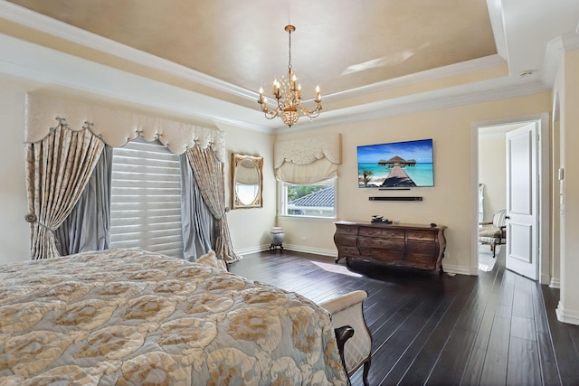 bedroom with dark hardwood / wood-style flooring, an inviting chandelier, a raised ceiling, and crown molding