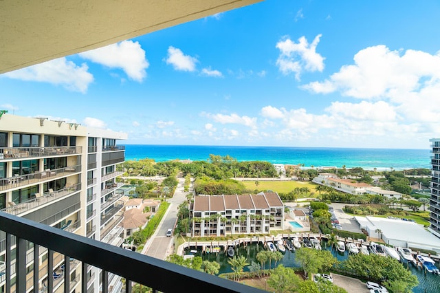 balcony featuring a water view