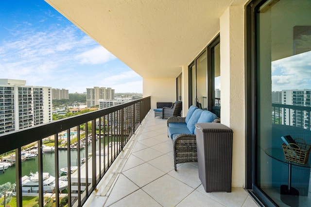 balcony featuring a water view