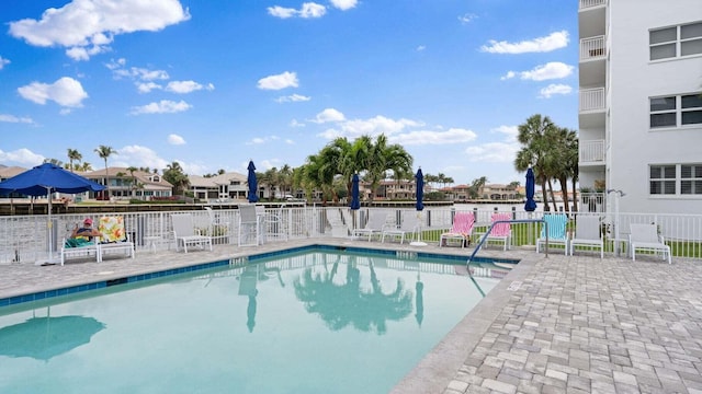 view of pool featuring a patio