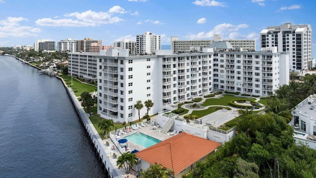 birds eye view of property with a water view