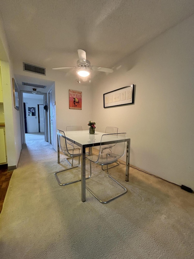 3400 Springdale Blvd Unit 307, Palm Springs, FL 33461 - carpeted dining area with ceiling fan and a textured ceiling