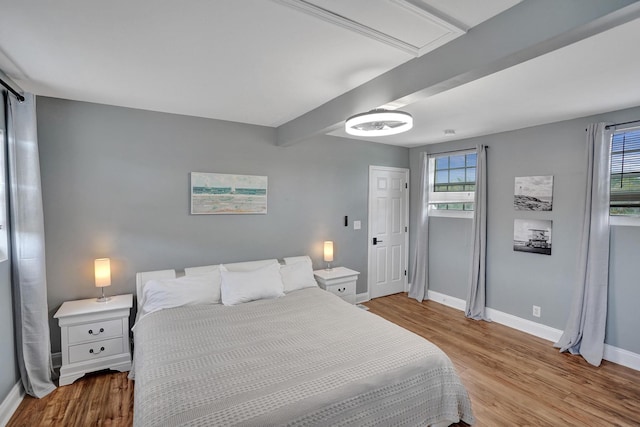 bedroom with light hardwood / wood-style floors