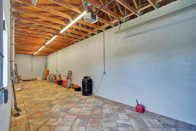 garage featuring a garage door opener