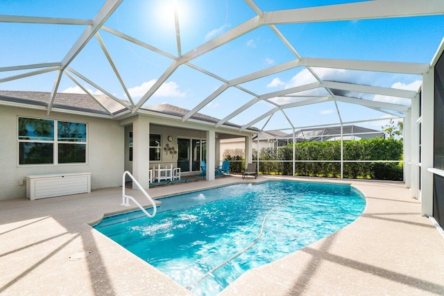 pool with a patio area