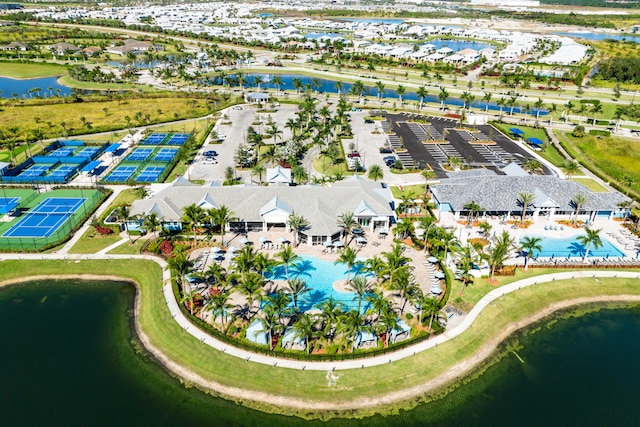 drone / aerial view with a residential view and a water view