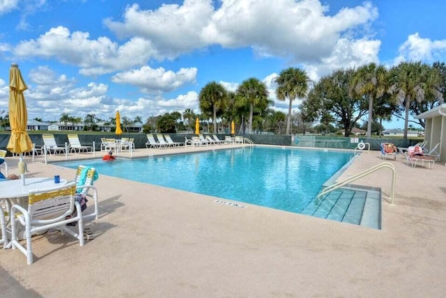 view of pool with a patio area