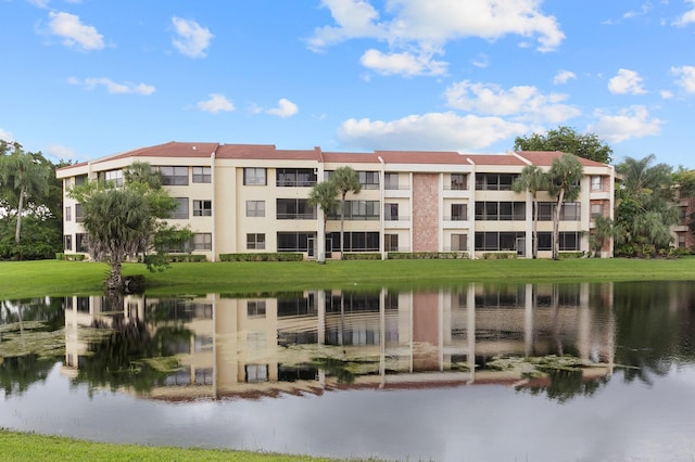 view of property with a water view