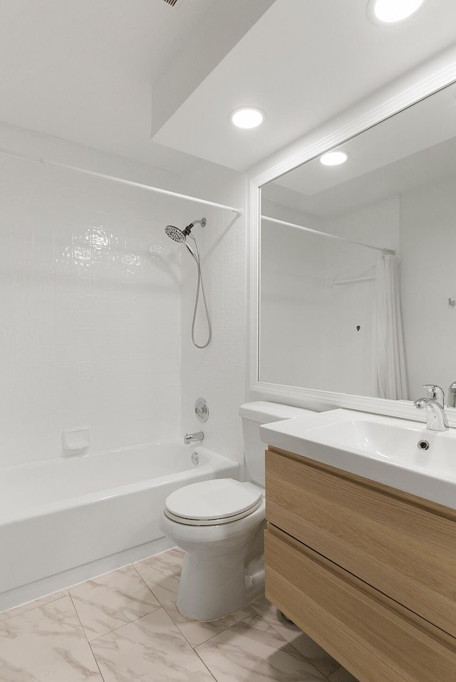 full bathroom featuring shower / bath combination with curtain, toilet, and vanity