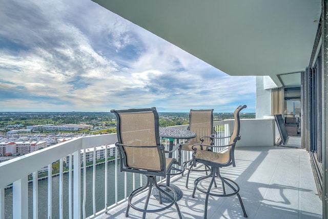 balcony featuring a water view