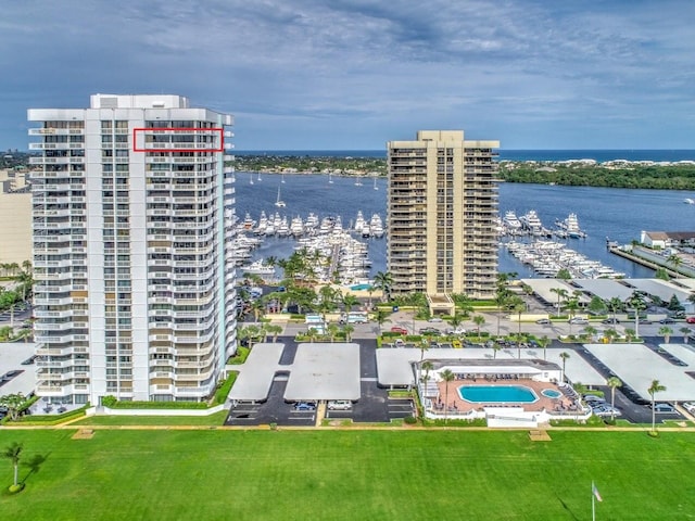 birds eye view of property featuring a water view