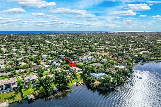 drone / aerial view with a water view