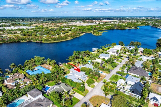 drone / aerial view featuring a water view