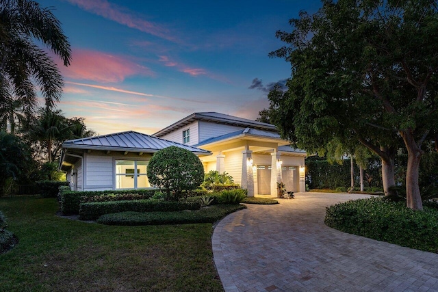 view of front of home with a yard