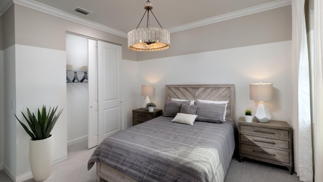 bedroom featuring a closet, light colored carpet, ornamental molding, and a chandelier