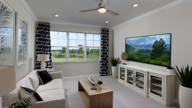 living room featuring crown molding, carpet, and ceiling fan