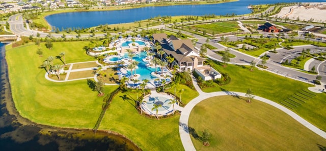 birds eye view of property featuring a water view