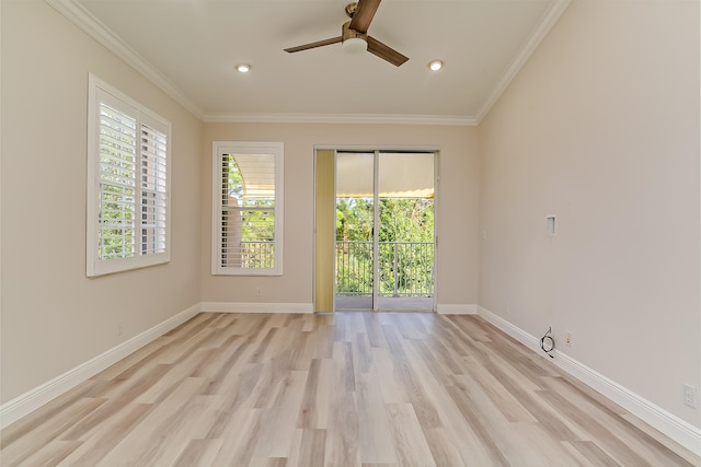 empty room with light hardwood / wood-style floors, ceiling fan, and crown molding