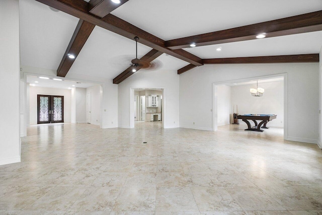 unfurnished living room with pool table, an inviting chandelier, french doors, and vaulted ceiling with beams