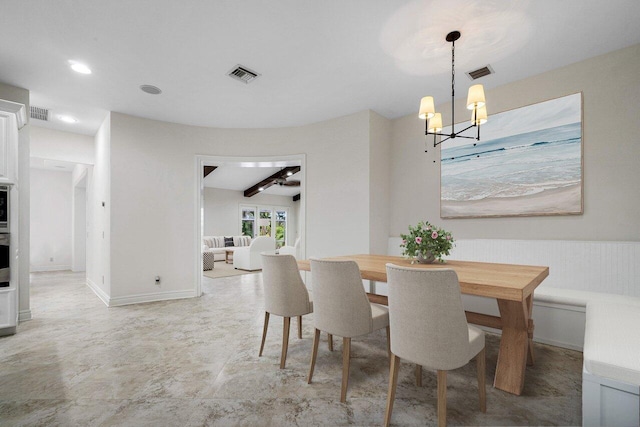 dining room with beam ceiling and a notable chandelier