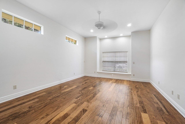 spare room with ceiling fan and hardwood / wood-style floors