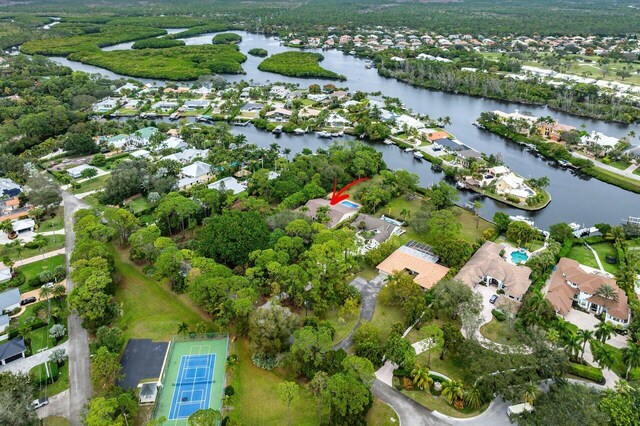 birds eye view of property featuring a water view