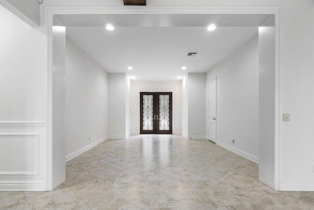 entryway featuring french doors