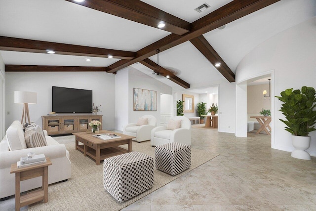 living room featuring vaulted ceiling with beams