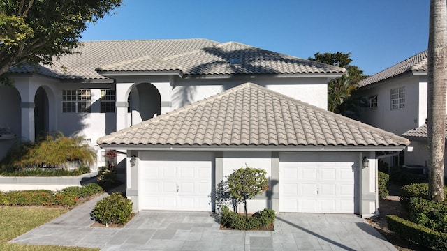 view of front of property with a garage