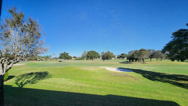 view of community featuring a yard