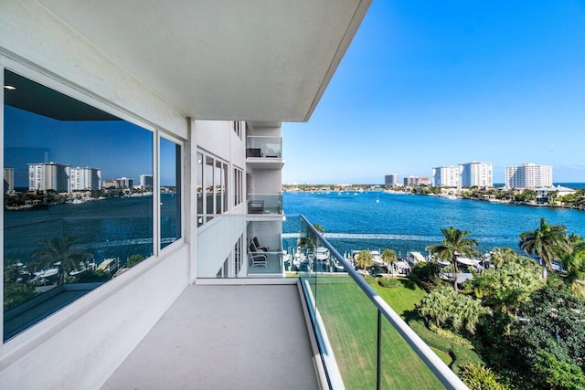 balcony featuring a water view