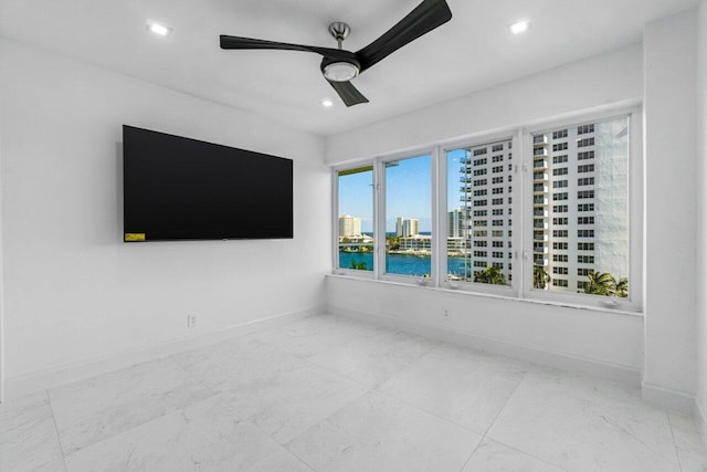 empty room featuring ceiling fan