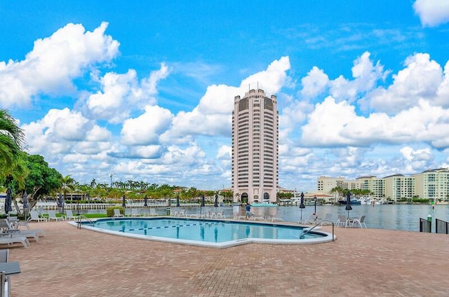 view of swimming pool featuring a patio