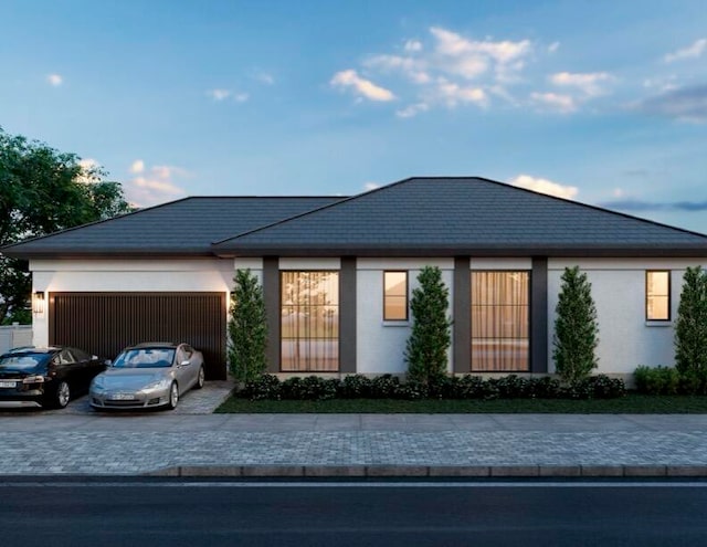 view of front of property with a garage