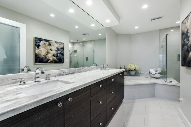 bathroom with separate shower and tub, tile patterned flooring, and vanity