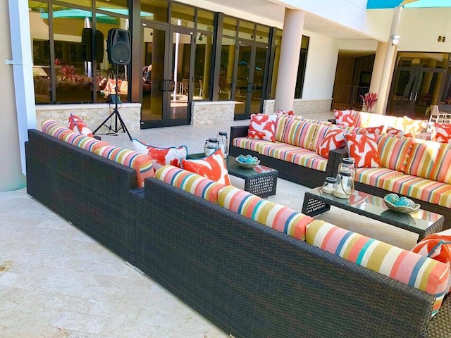 view of patio featuring outdoor lounge area and french doors