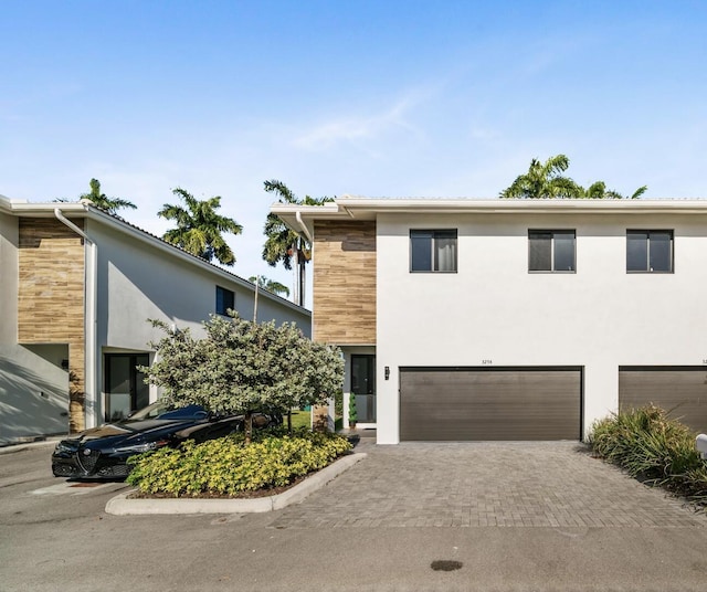 view of front of property with a garage