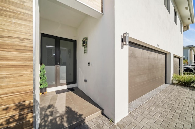 property entrance featuring french doors