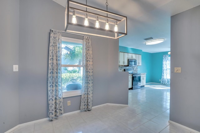 interior space with light tile patterned floors