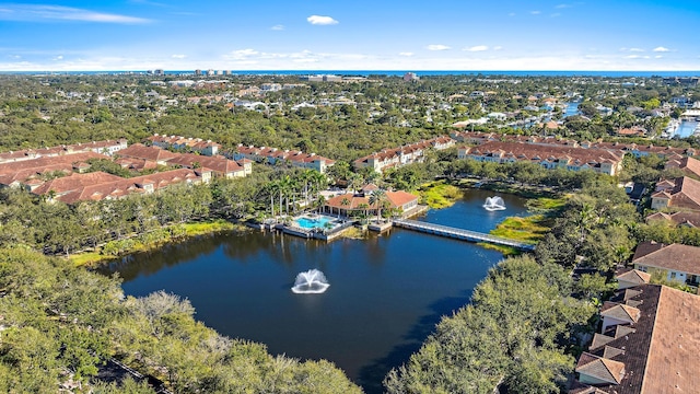 bird's eye view with a water view and a residential view