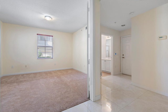 view of tiled spare room