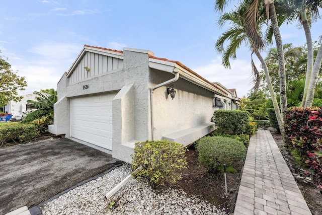 view of home's exterior with a garage