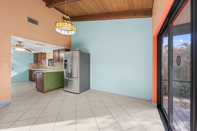 kitchen with decorative backsplash, stainless steel refrigerator with ice dispenser, light tile patterned floors, wooden ceiling, and hanging light fixtures