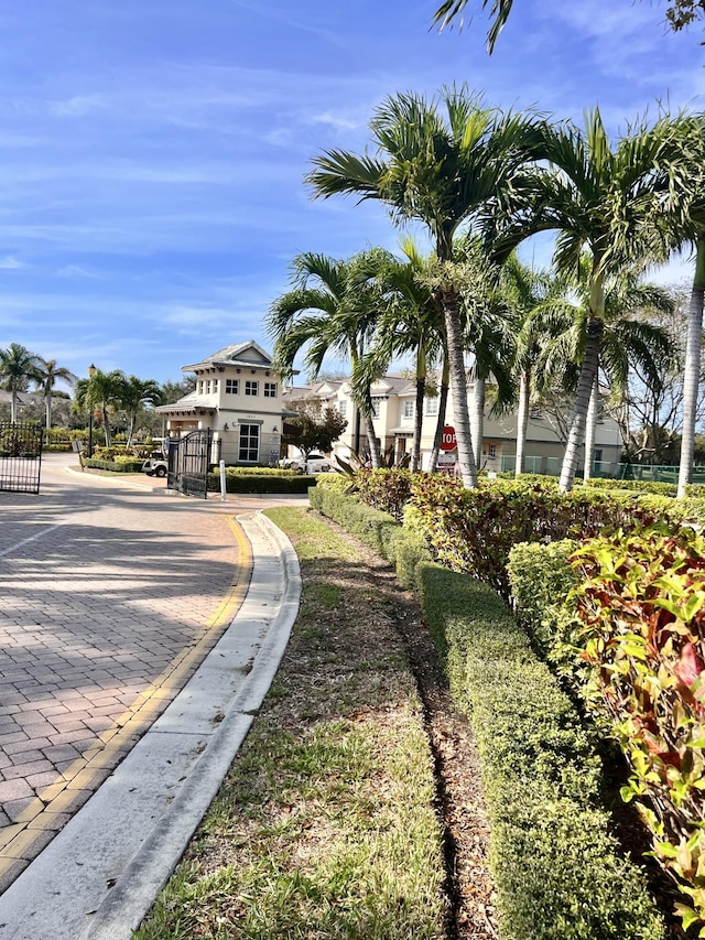 surrounding community featuring a gate