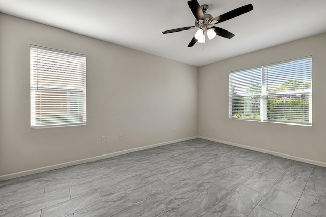 empty room featuring ceiling fan